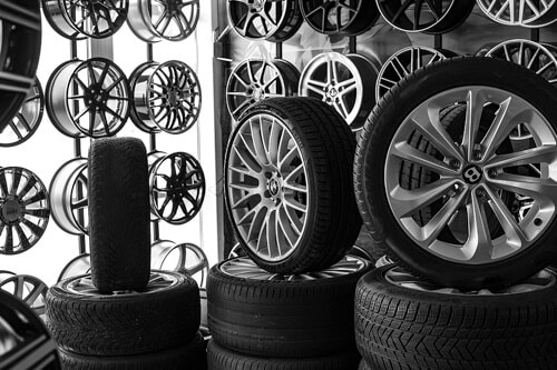 How to Choose the Right Tires in Klein, TX with Repair One Auto image of different rims and tires for sale
